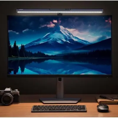 Baseus i-wok3 Magnetic Monitor Light 2024 Desk Setup Baseus i-wok3 monitor light above a screen displaying a mountain landscape, illuminating a keyboard and desk