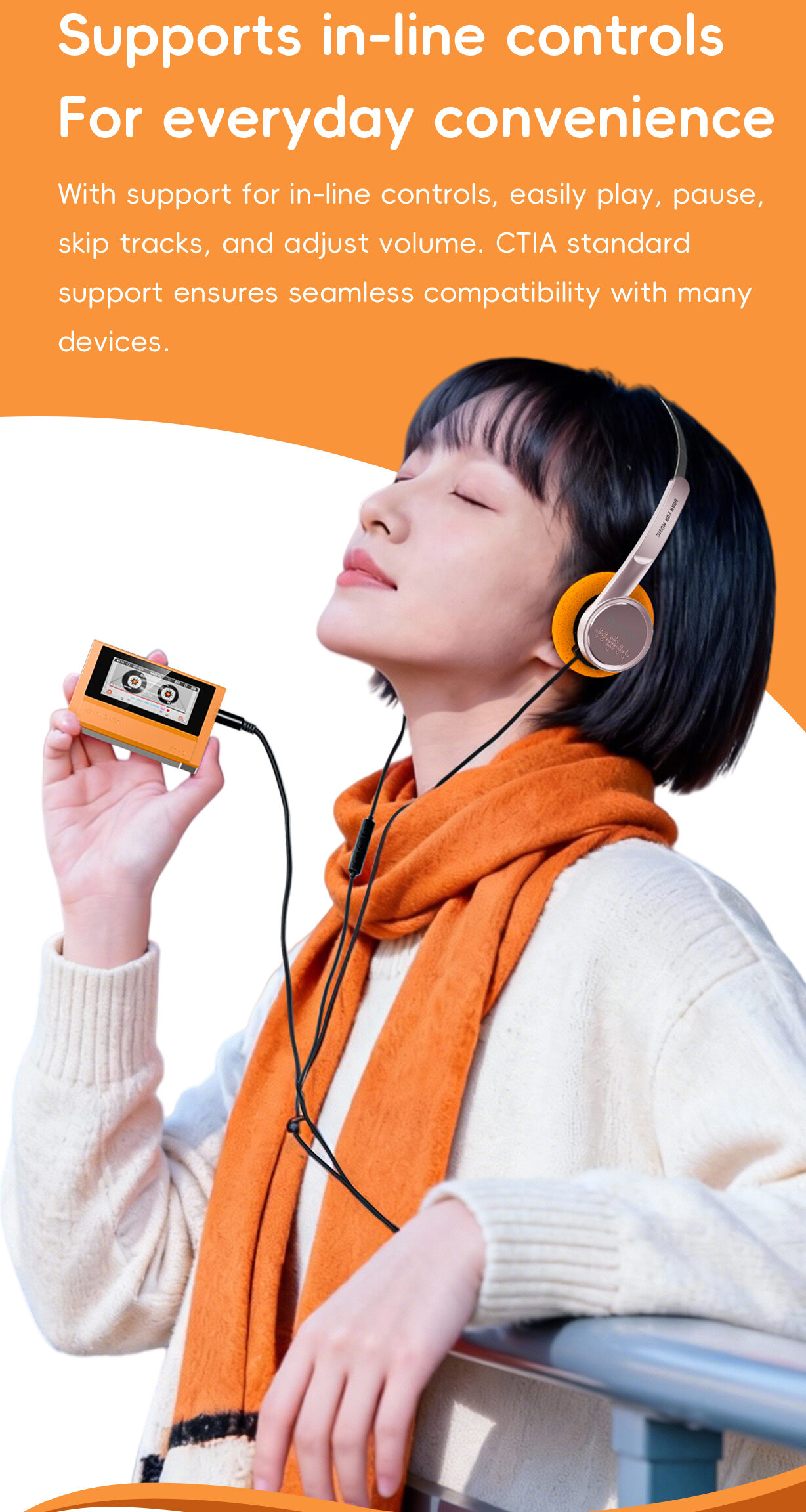 FiiO SNOWSKY ECHO – Wired Listening and In-Line Controls Woman listening through wired headphones while holding an orange FiiO SNOWSKY ECHO music player