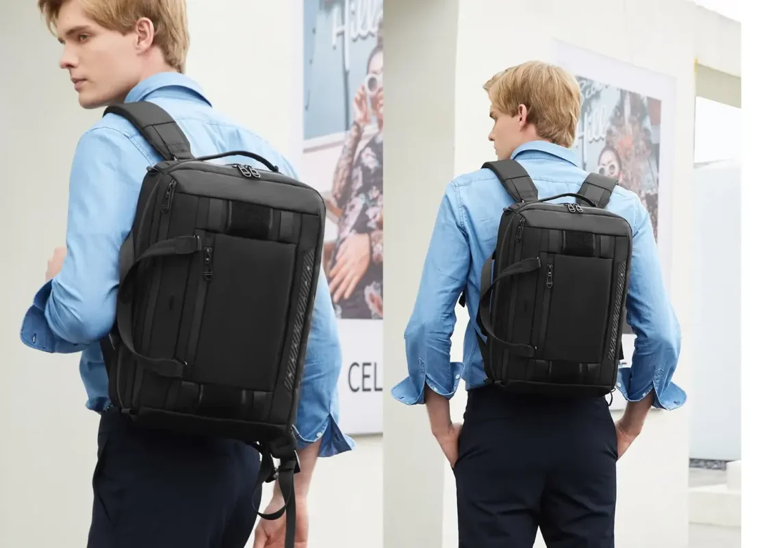 OZUKO 9749 Business Backpack Carrying Mode Man carrying OZUKO 9749 business laptop bag as a backpack