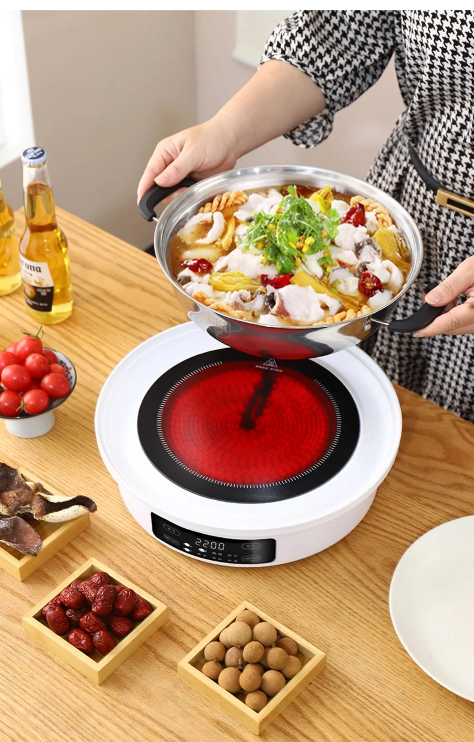 Electric Tea Stove with Glass Kettle and Roasting Tray Electric tea stove with a glass kettle and roasting tray holding fruit, nuts and dates