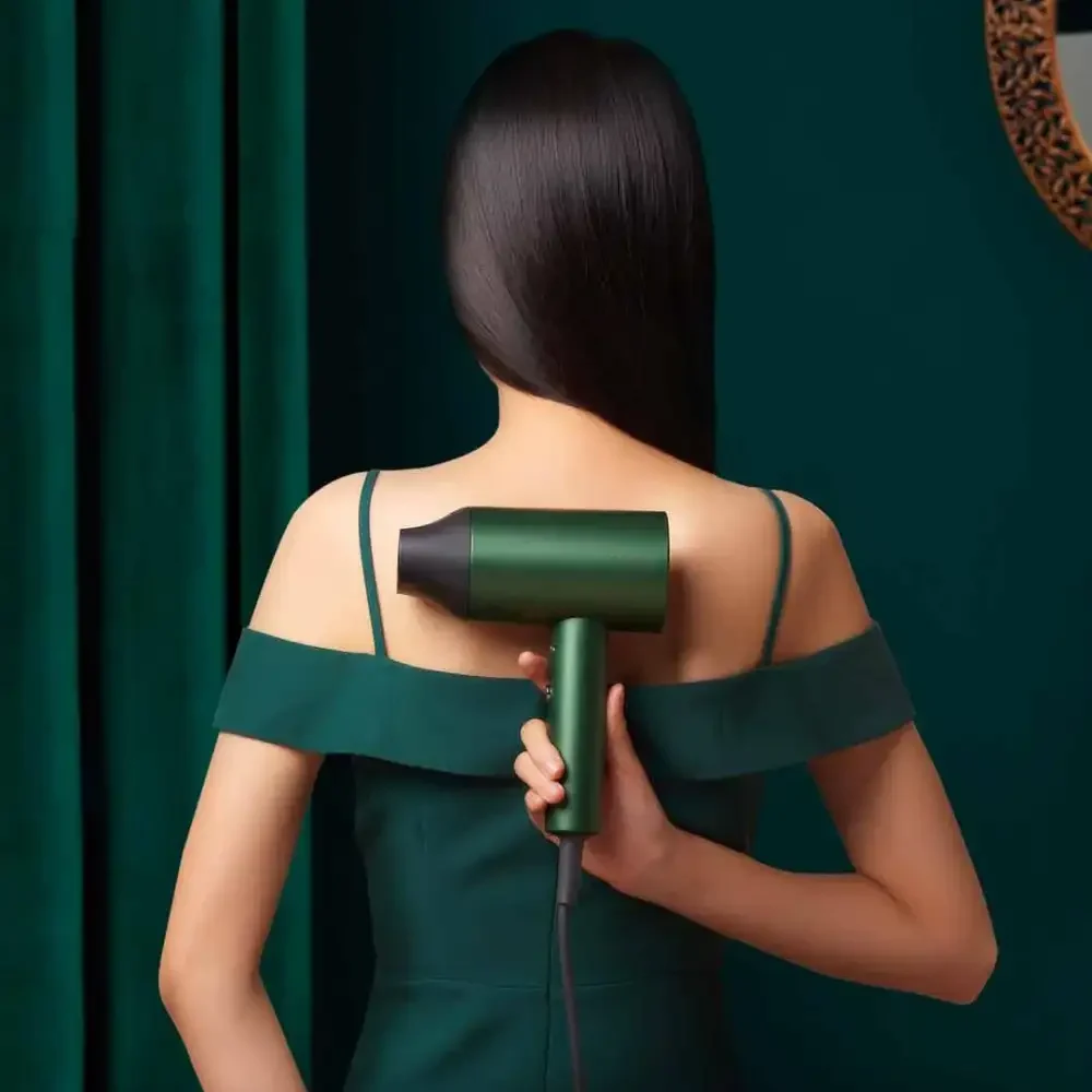 SHOWSEE A5-G Hair Dryer Rear Lifestyle View Woman seen from behind holding a green SHOWSEE A5-G hair dryer behind her back